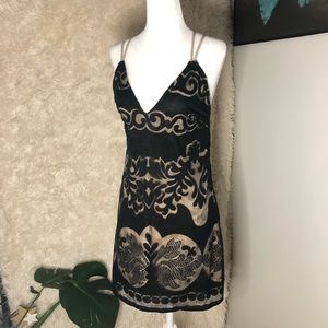 Jaw-dropping, near backless lace dress